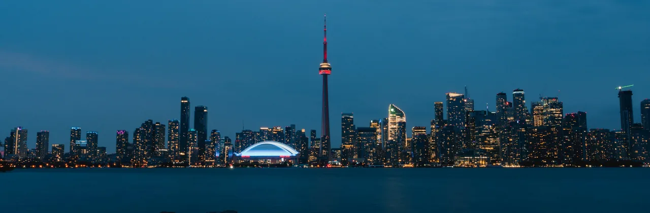 The Toronto skyline at night seen across the water